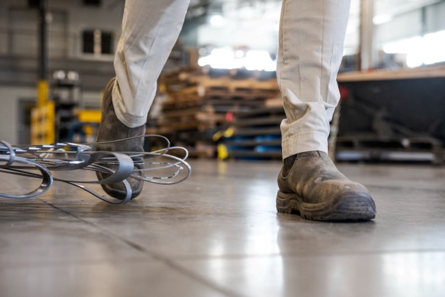 Person Walking in a warehouse